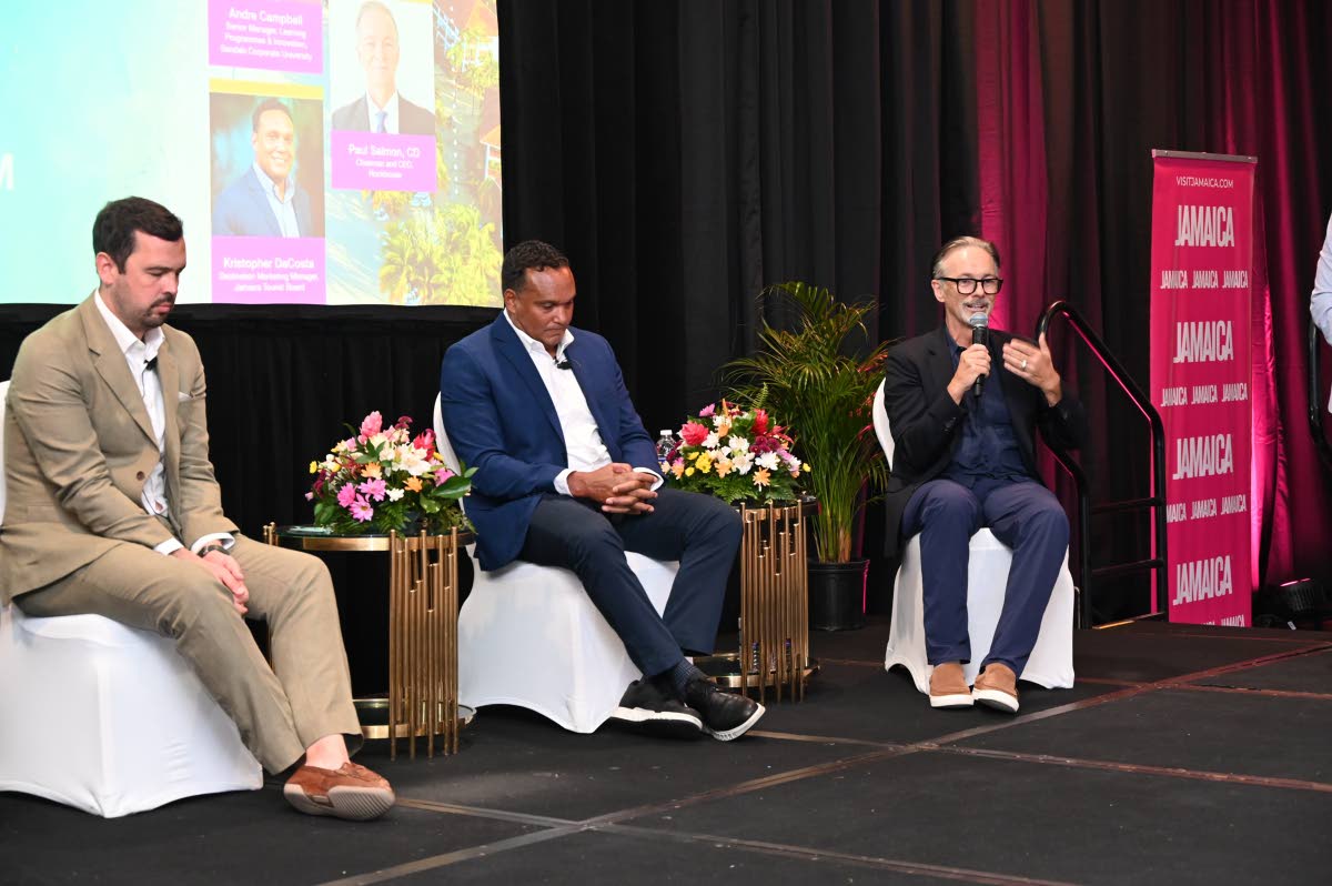 Kristopher DaCosta (centre) of the Jamaica Tourist Board and Accenture’s Dean Challis listen to RochHouse Hotel’s owner Paul Salmon (right) during a forum on artificial intelligence at the recently concluded JAPEX in Ocho Rios, St Ann.