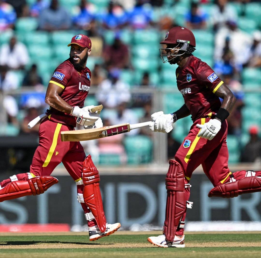 John Campbell (left) and Justin Greaves go for a run during their partnership of 135 against India recently. Greaves scored 101.