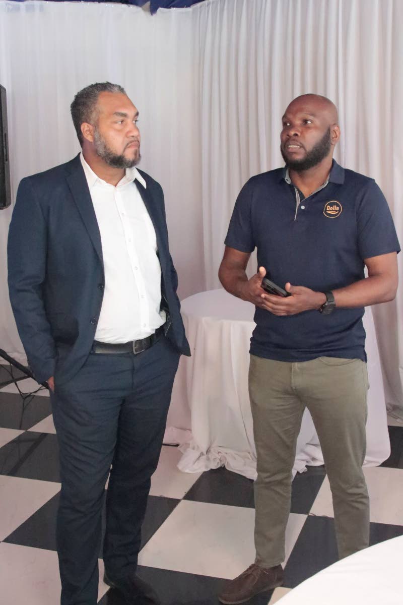 From left: Brian Munroe, senior relationship manager at Mayberry Investments Limited, and Kenroy Kerr, CEO of Dolla Financial Services Limited, engage in discussion at the Beyond the Portfolio breakfast mingle. Hosted at the Terra Nova All Suite Hotel in S