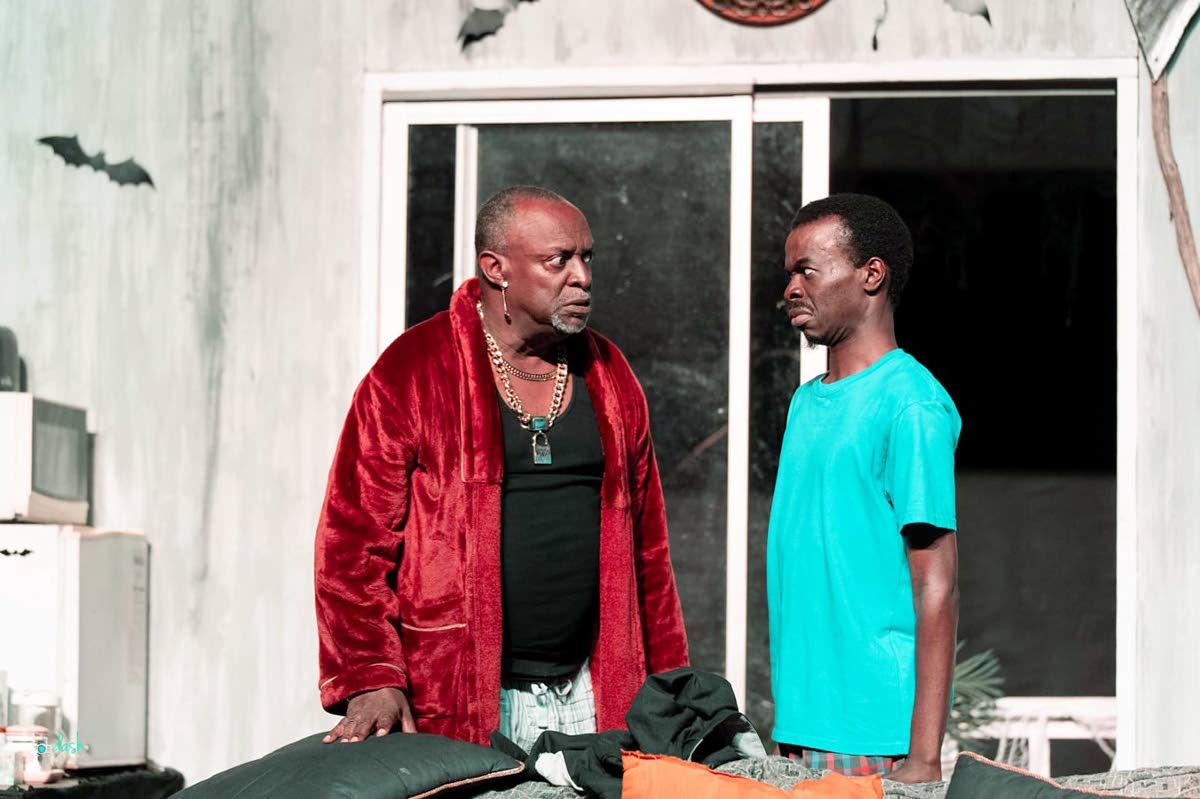 Jomo (Desmond Dennis) tries to talk sense into his older brother John (Glen Campbell) as he brought home a woman whose presence will change his life.