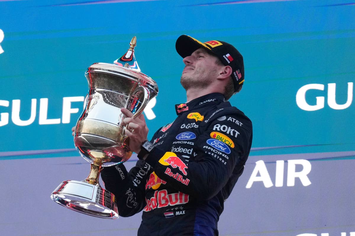 Red Bull driver Max Verstappen of the Netherlands celebrates on the podium after winning the Bahrain Grand Prix in Sepang, Malaysia, Sunday, October 4, 2026. 