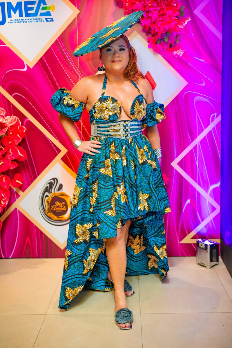 Digicel General Manager Kristalle Chin brings the print through to her accessories, pairing an asymmetric Ankara-inspired Tamia Carey design with a matching disc hat.