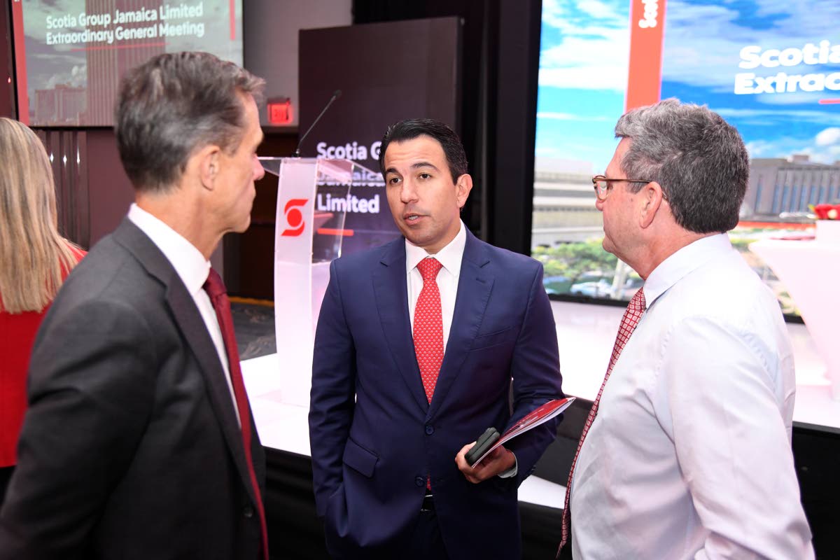 Jabar Singh (centre), president of Scotiabank Dominican Republic and the Caribbean, is flanked by stakeholders at the AC Hotel in St Andrew on Wednesday.