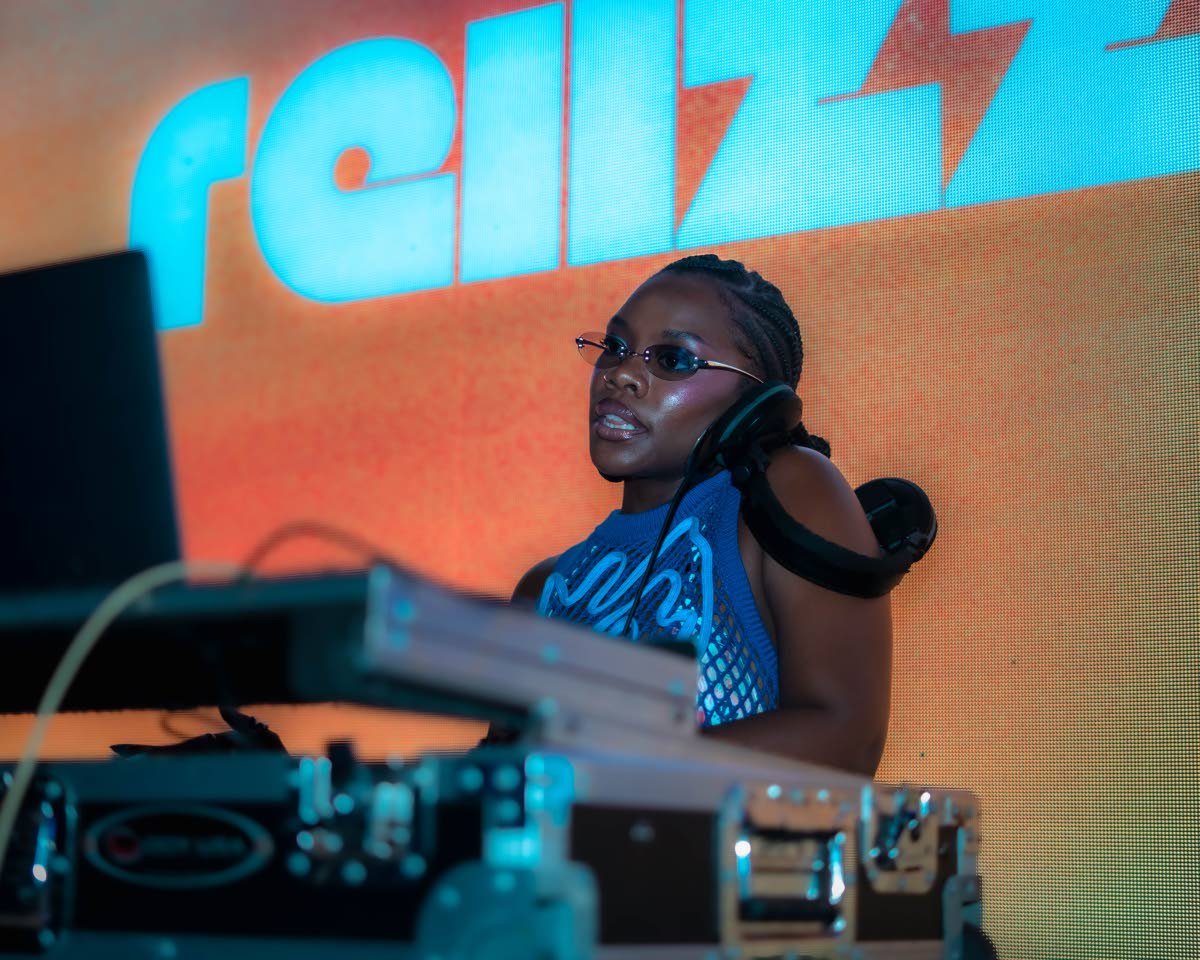 Reina Mshana – in full light mode as DJ Reiizzzr – spins on the ones and twos as the film festival’s welcome party maestro.