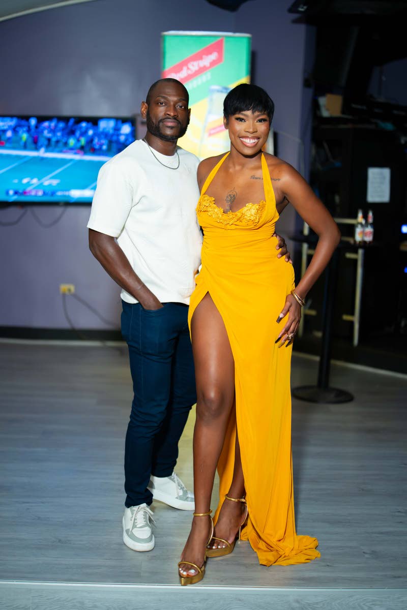 ‘Bombshell Weekend’ cast member Jermaine ‘Scottycuss’ Watson poses with executive producer Petegay Gentles.