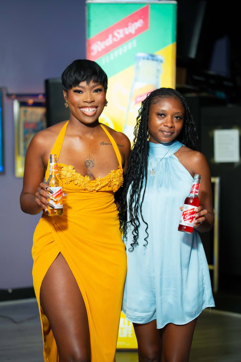 ‘Bombshell Weekend’ creator and executive producer Petegay Gentles (left) celebrates the series’ partnership with official beverage partner Red Stripe Flavours alongside Junior Brand Manager Laurice Griffiths.