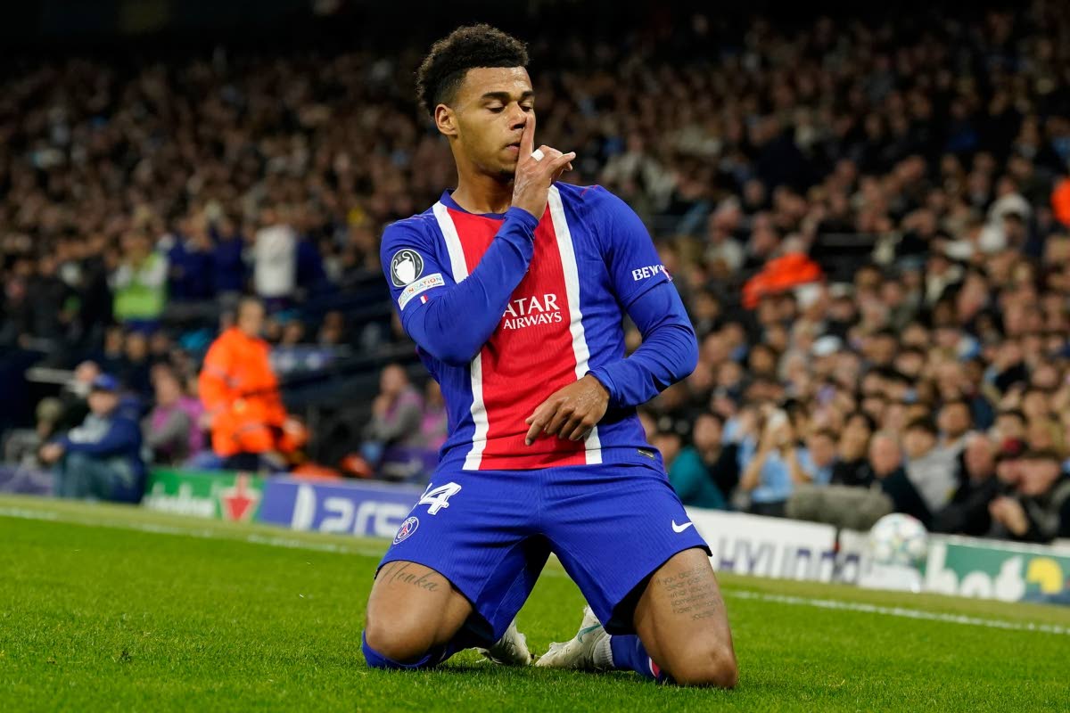 PSG's Desire Doue celebrates after scoring his side's opening goal during the Champions League opening phase soccer match between Manchester City and Paris Saint-Germain in Manchester, England, on Wednesday.