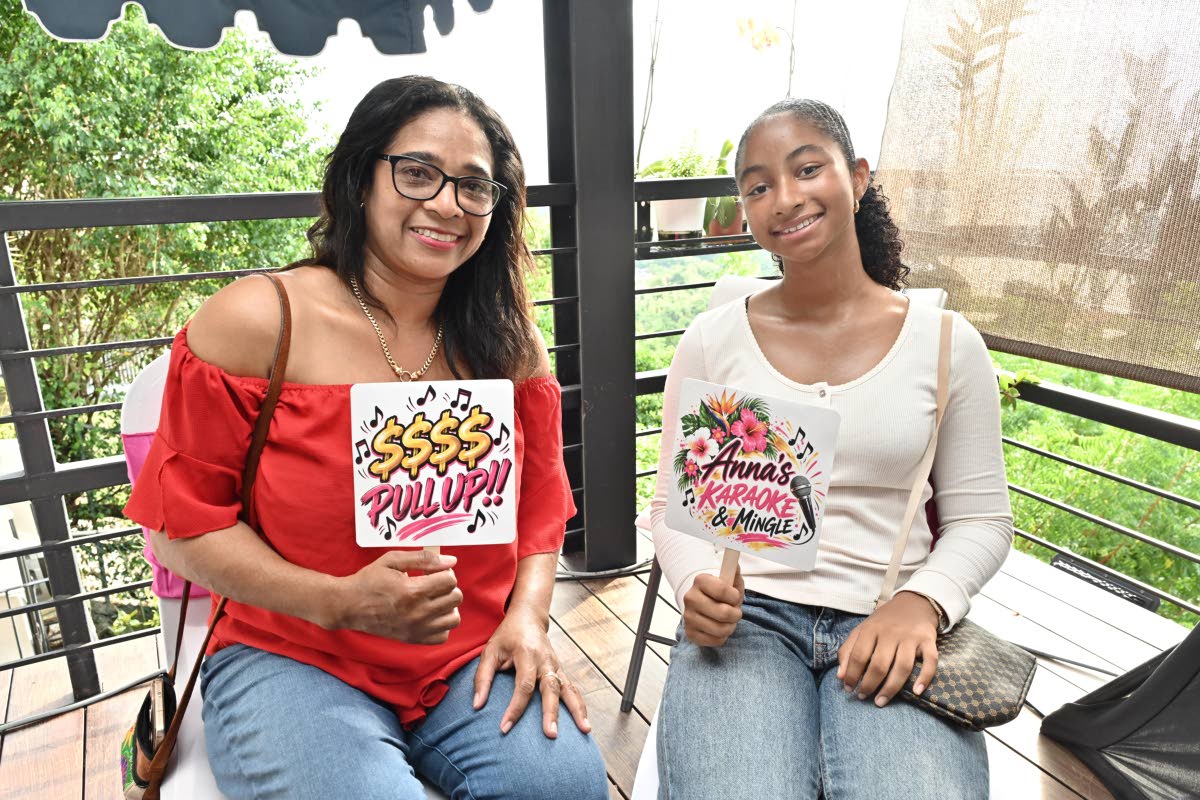 Horticulturist Gillian Dewar (left) and daughter Gabriella Garcia enjoy a relaxed moment while supporting a cause close to many hearts.