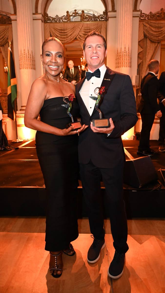 Jamaican-American actress Sheryl Lee Ralph and Adam Stewart, executive chairman of Sandals Resorts International, pose with their awards at the American Friends of Jamaica’s 45th anniversary Hummingbird Gala at The Plaza in Manhattan, New York, last Frid