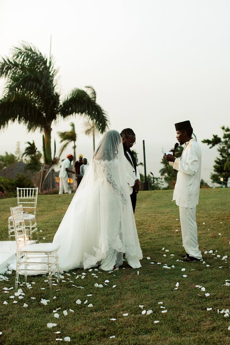 Ethiopian Orthodox priest Kez Haile Mikael joins Samory I and Cece in holy matrimony.