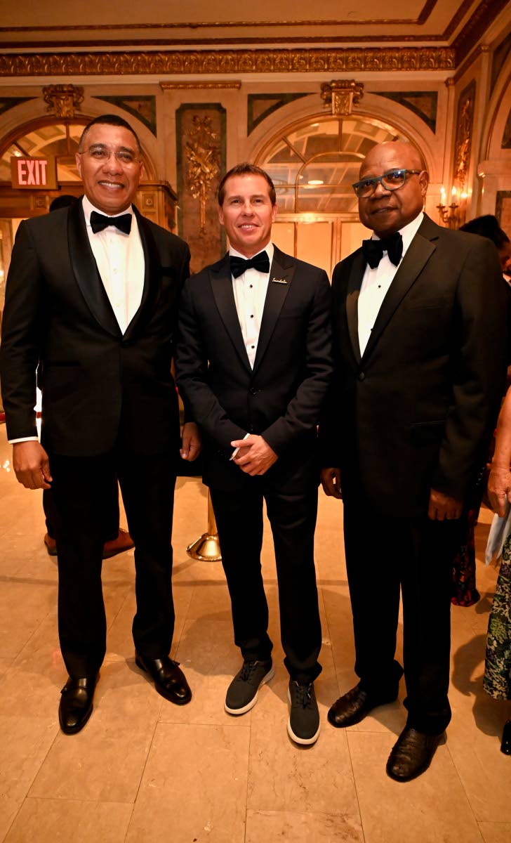 From left: Prime Minister Dr Andrew Holness; Adam Stewart, executive chairman of Sandals Resorts International; and Tourism Minister Edmund Bartlett look sharp in their black tuxedos.