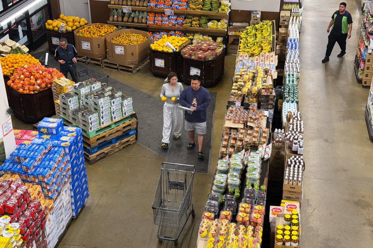 AP
Shoppers are seen at a grocery store in Glenview, Illinois on Wednesday, October. 14.   