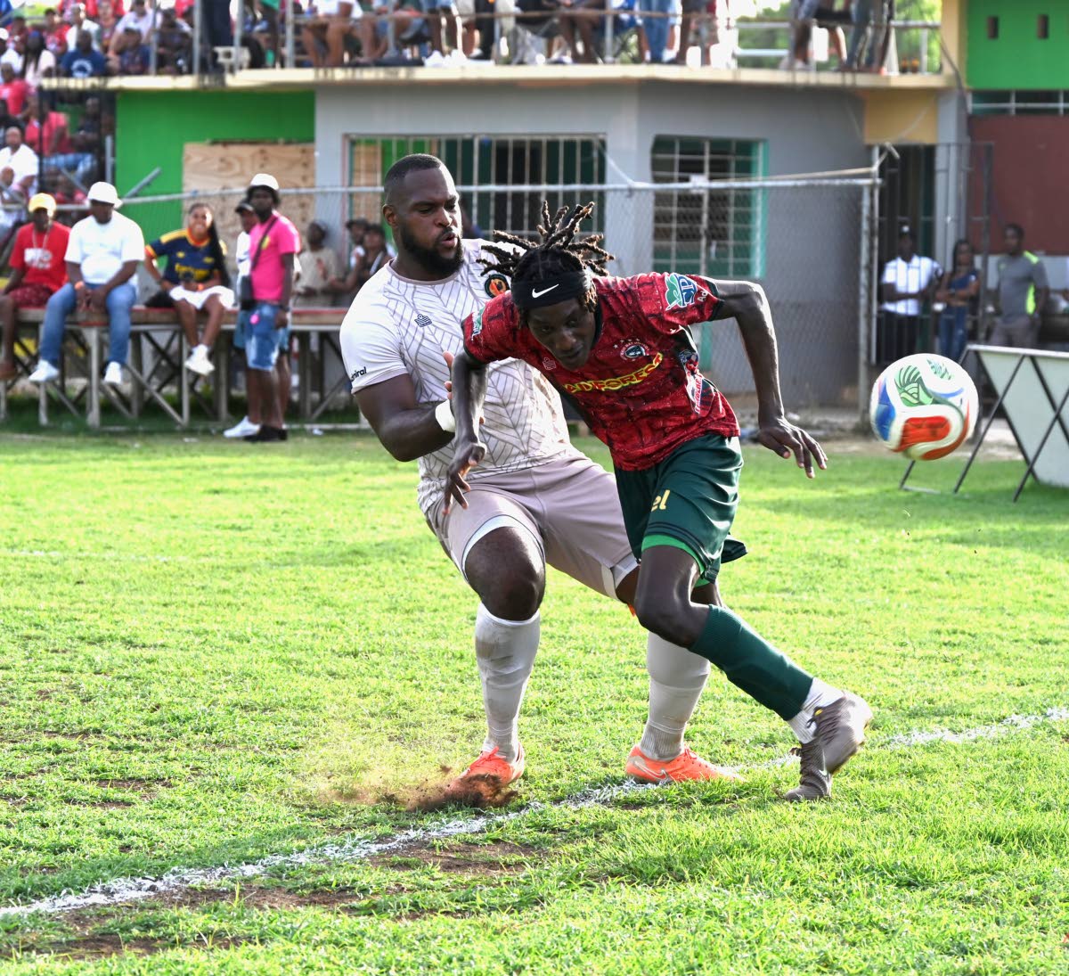 Montego Bay United’s Deonjay Brown (right) is challenged by Chapleton Maroons’ Josiah Trimmingham during their Jamaica Premier League football game at Jarrett Park in September. MoBay United won 3-0.