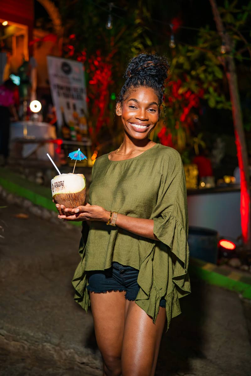 Right: Our cameras caught a spirited smile from media personality Lee-Ann Smith.