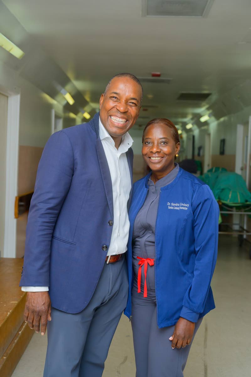 Dr Carl Bruce, medical chief of staff at the University Hospital of the West Indies (UHWI), poses with Dr Sandra Lindsay, vice president of public health advocacy at Northwell Health and mission lead.