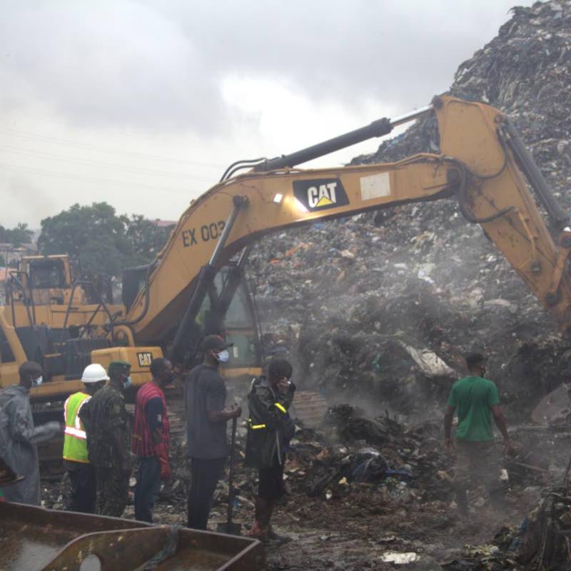 Landslide at landfill in the capital of Guinea kills 30 people, officials say