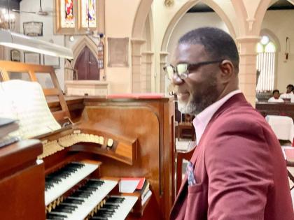 Right: Organist and choir director, Audley Davidson, is celebrating 25 years at the St. Andrew Parish Church.