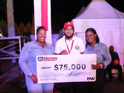 Sanya Wallace-Innerarity (left), assistant general manager – strategy, marketing and sales, JN Money; and Cedrica Reid (right), marketing and sales manager, JN Money, celebrate with second place winner, Mobolji Bryan, in the CB PAN Chicken Competition he