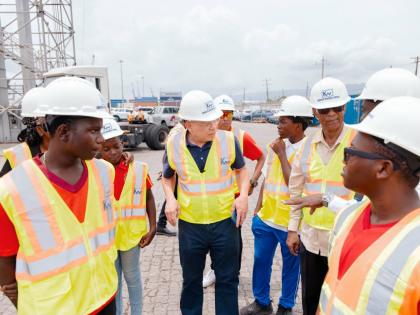 A group of 10 young men from the Boys’ Town Youth Club recently got an inside look at Jamaica’s vibrant port operations during an educational visit to Kingston Wharves, a subsidiary of Pan Jamaica Group (PJG). Led by PJG Vice Chairman and CEO Jeffrey H
