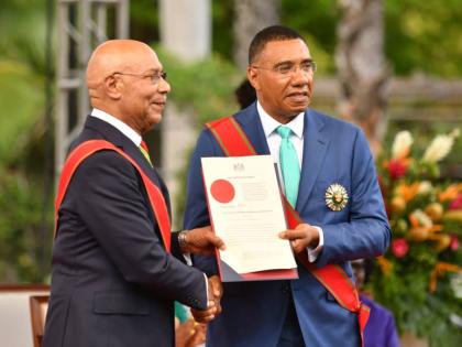 Governor General Sir Patrick Allen (right) with Prime Minister Dr Andrew Holness at King's House. Holness was sworn in on September 16. 