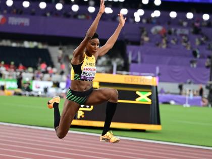 Shanieka Ricketts competing in the women’s triple jump qualification round at the World Athletics Championships inside the Japan National Stadium in Tokyo yesterday. 