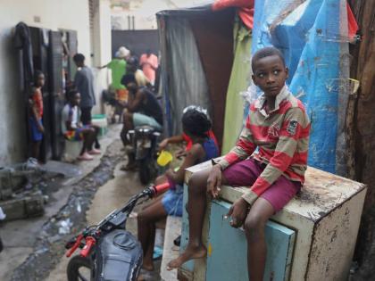 People displaced by gang violence live at the Ministry of Public Works, Transport and Communications office converted into a shelter in Port-au-Prince, Haiti.