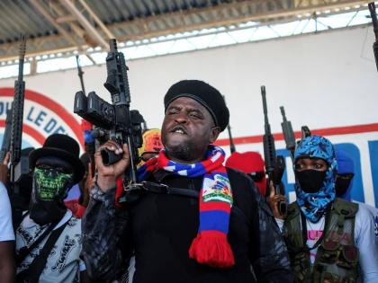 One gang leader, Jimmy Chérizier, best known as Barbecue, vowed to avenge the attacks. (AP Photo/Matias Delacroix, File)