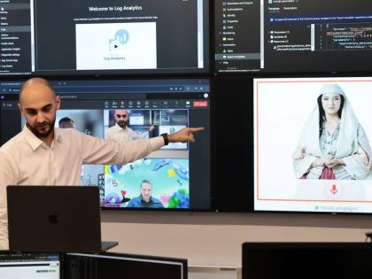 Enio Kaso, head of the Department of Artificial Intelligence and Cryptocurrency Licensing, shows the AI ‘minister’ Diella, whose name means ‘sun’ in Albanian, during a conference call in Tirana.