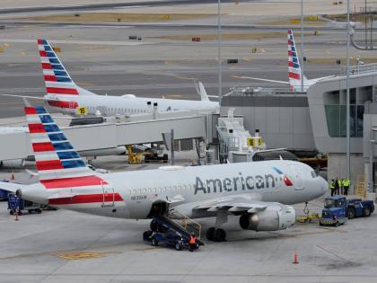American Airlines planes sit on the tarmac at LaGuardia Airport, January 11, 2023, in New York.
