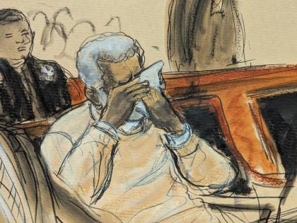 In this courtroom sketch, Sean Diddy Combs breaks down and cries during the playing of a video about his life during his sentencing hearing in Manhattan federal court, Friday, October 3, 2025, in New York. (Elizabeth Williams via AP)
