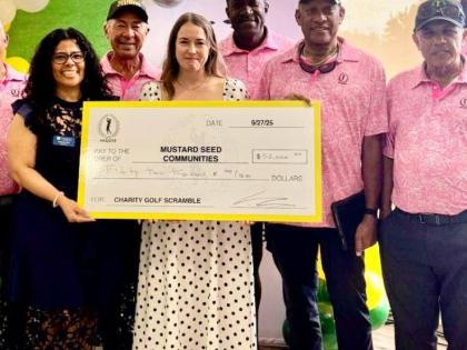  The Miami-based Paquee Golf Club has raised J$10.5 million for Mustard Seed Communities in Jamaica towards the caring of the disabled and abandoned children and adults. From left are representatives of Mustard Seed Communities and members of the Paquee Go