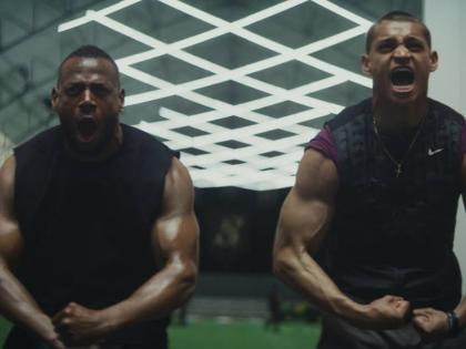 This image released by Universal Pictures shows Marlon Wayans (left) and Tyriq Withers in a scene from ‘Him’.