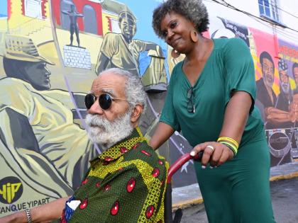 Monte Blake (left) and daughter, Monique Blake at the unveiling of the Merritone mural last year in the Kingston Creative Art District in downtown Kingston.