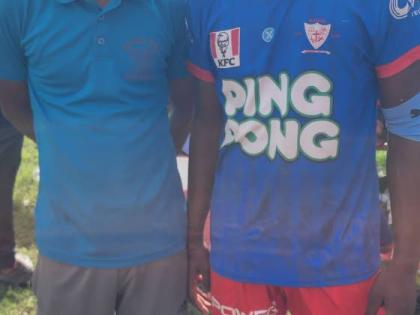 Kemps Hill’s coach Kiegon Mitchell (left) with Shamar Daley, one of his top players.