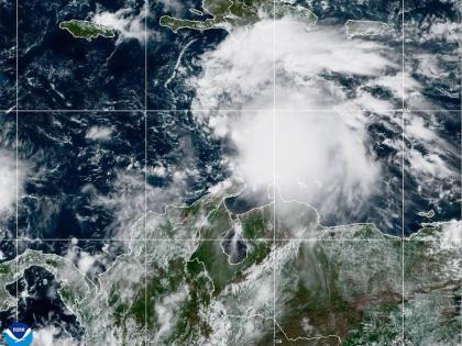 This NOAA satellite image taken at 11:40 a.m. EST on Tuesday, October 21, shows Tropical Storm Melissa in the Central Caribbean Sea. 
