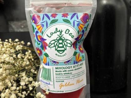 Golden hour, a warm embrace of Jamaica in a glass where rich sorrel, ripe strawberries, and a whisper of basil meet bold whiskey.