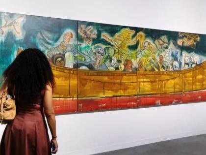 A visitor admires an artwork at Art Basel Miami Beach.