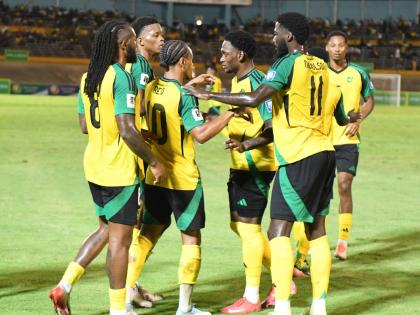 
Jamaica’s Bobby Reid (third left) celebrates opening the scoring against Bermuda during the Reggae Boyz’s 4-0 Concacaf World Cup Qualification victory at the National Stadium on October 14.