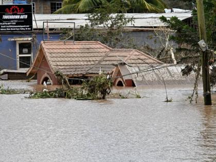Structures are seen submerged under water in Cave Valley, St Ann, after the passage of Hurricane Melissa.