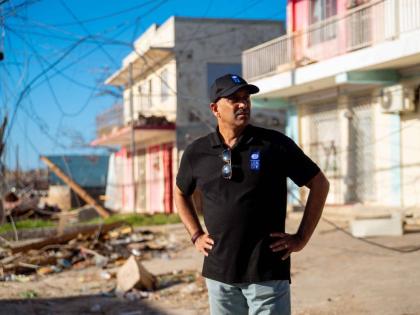 United Nations Development Resident Representative to Jamaica, Dr Kishan Khoday surveys the damage done in Black River, St Elizabeth in the aftermath of Hurricane Melissa.
