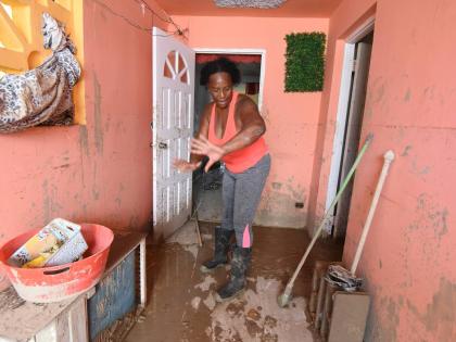 Merris Green from Westgreen/Catherine Hall in Montego Bay, St James, explains how floodwaters from Hurricane Melissa swept through her house destroying all her furnishings.