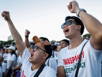 Members of the religious sect Iglesia Ni Cristo (Church of Christ) shout slogans during a three-day anti-corruption rally at Manila’s Rizal Park, Philippines.