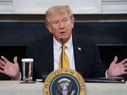 President Donald Trump answers questions from reporters during a round-table on criminal cartels in the State Dining Room of the White House, October 23, 2025, in Washington. (AP Photo/Evan Vucci, File)