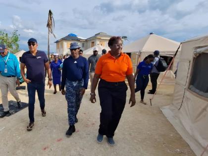 From left: St Andrae Sinclair, regional director, Western Regional Health Authority; Dr Christopher Tufton, minister of health and wellness; Lt Comm Anderson Goodridge, commander of the Barbados emergency medical team; and Captain Dr Ayana  Crichlow, clini