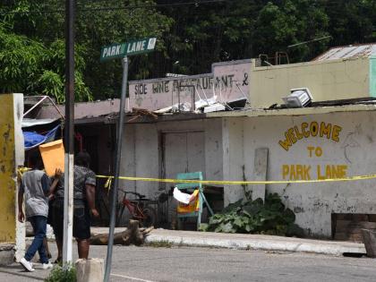 Park Lane, off Red Hills Road in St Andrew, was the scene of another murder on Sunday.