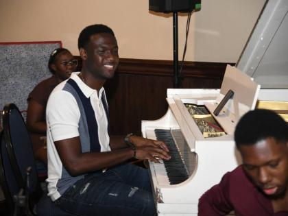 Evad Campbell on piano. 