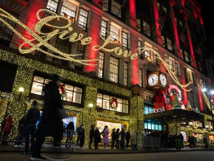 
Shoppers wait in line to enter Macy’s flagship store on November 28, 2025 in New York.