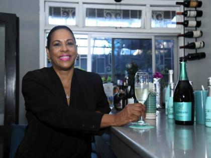 Fashion expert and entrepreneur, Sophia Max-Brown, enjoys a sip of the Cipriani Prosecco at TRIO Grill Wine Bar.