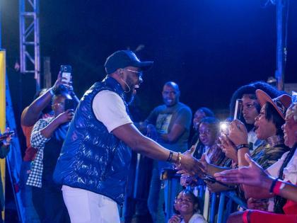 Kevin Downswell greets patrons at Genesis Praise Fest on New Year’s Day in St Andrew, before stepping on stage to close the show.