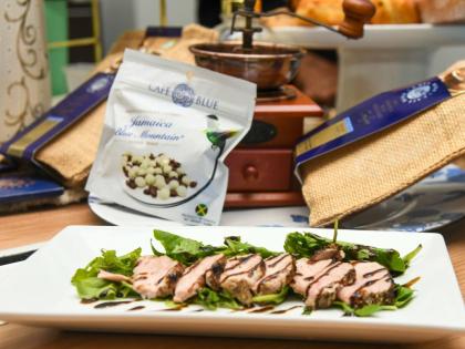 The Blue Mountain Coffee-rubbed pork tenderloin, is also topped with a coffee balsamic glaze.